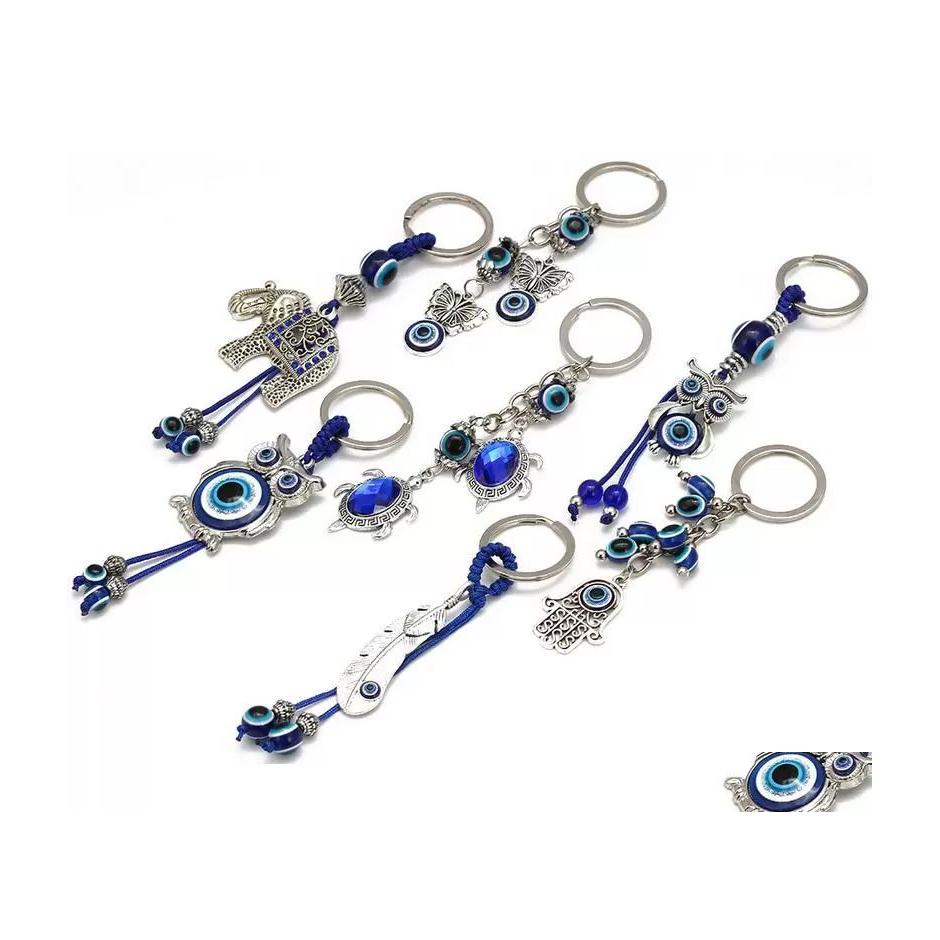 Keychains Lanyards Animal Butterfly Turtle Elephant Evil Eyes Keychain Key Chain Glass Blue Eye Pendant Ornament Rin Drop Delivery Dhrp6
Keychains Lanyards Animal Butterfly Turtle Elephant Evil Eyes Keychain Key Chain Glass Blue Eye Pendant Ornament Rin Drop Delivery Dhrp6