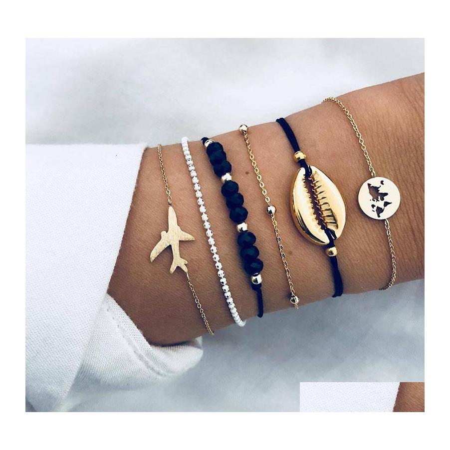 Charm Bracelets 6Pcs/Lot Bohemian Sea Shell Set For Women Gold Aircraft Map Crystal Beads Chains Bangle Female Fashion Boho Drop Del Otjsk
Charm Bracelets 6Pcs/Lot Bohemian Sea Shell Set For Women Gold Aircraft Map Crystal Beads Chains Bangle Female Fashion Boho Drop Del Otjsk