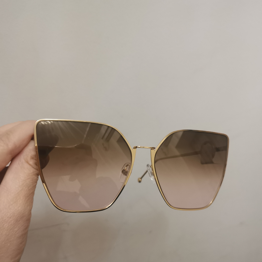 Gold Metal Cat Eye Sunglasses for Women 0323 Golden Brown Mirror Sun Glasses Sonnenbrille Shades Designer Sunglasses gafas de sol UV400 Protection Eyewear with Box
Gold Metal Cat Eye Sunglasses for Women 0323 Golden Brown Mirror Sun Glasses Sonnenbrille Shades Designer Sunglasses gafas de sol UV400 Protection Eyewear with Box