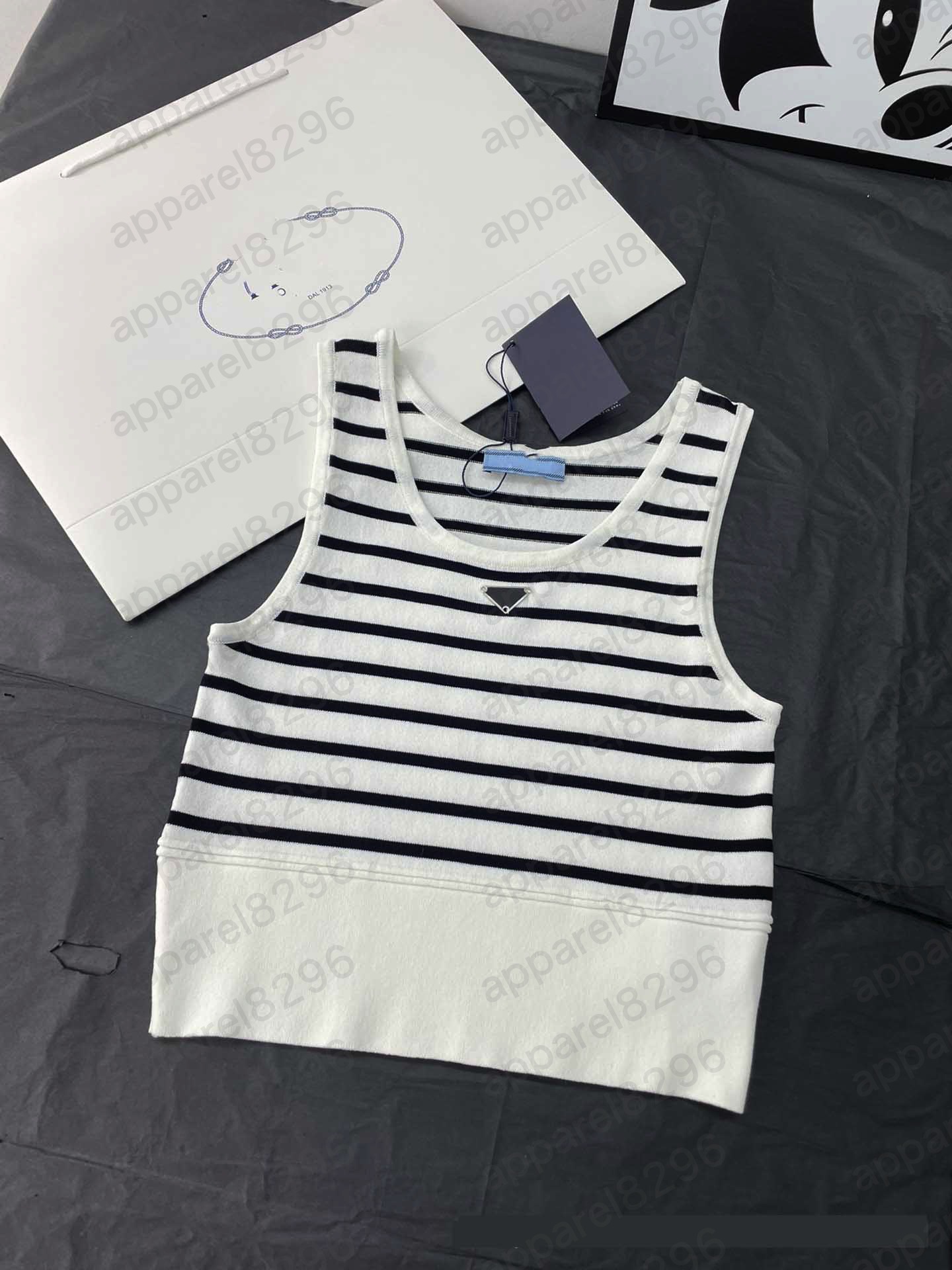 PAA Women Clothing Knits Tees Designer luxury Triangle Label Design Jacquard Silhouette Knitted Sleeveless Vest Sweater Simple and Stylish black white
PAA Women Clothing Knits Tees Designer luxury Triangle Label Design Jacquard Silhouette Knitted Sleeveless Vest Sweater Simple and Stylish black white