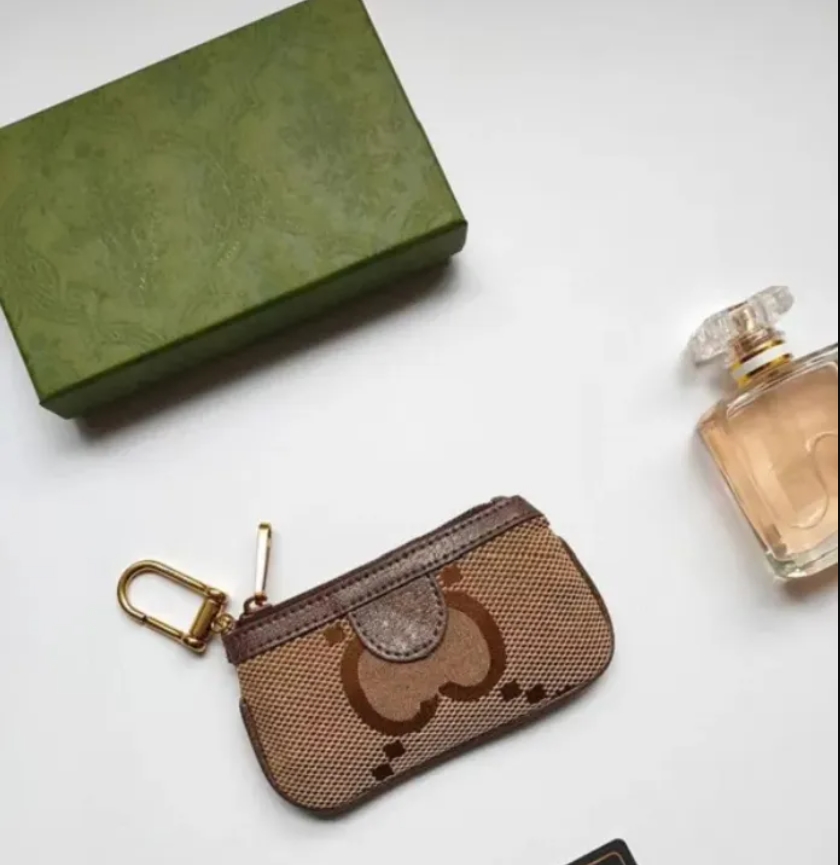 7A Coin Purse Key Wallet Pochette Small Pouch Designer Fashion Lipstick bags Womens Mens Key-Ring Credit Card Holder Luxury Mini Wallets Bag Charm Purses many colors, Brown big letter
7A Coin Purse Key Wallet Pochette Small Pouch Designer Fashion Lipstick bags Womens Mens Key-Ring Credit Card Holder Luxury Mini Wallets Bag Charm Purses many colors, Brown big letter