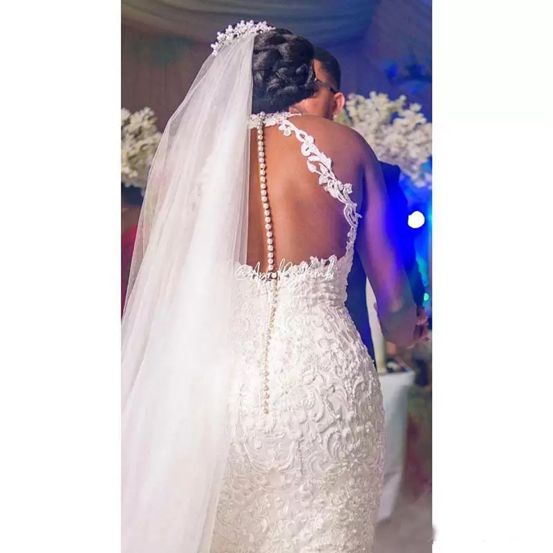 Royal African Nigeria Mermaid Wedding Dresses Halter Buttons Illusion Back Sleeveless Long White Bridal Gowns Lace Applique Elegant Bride Dress