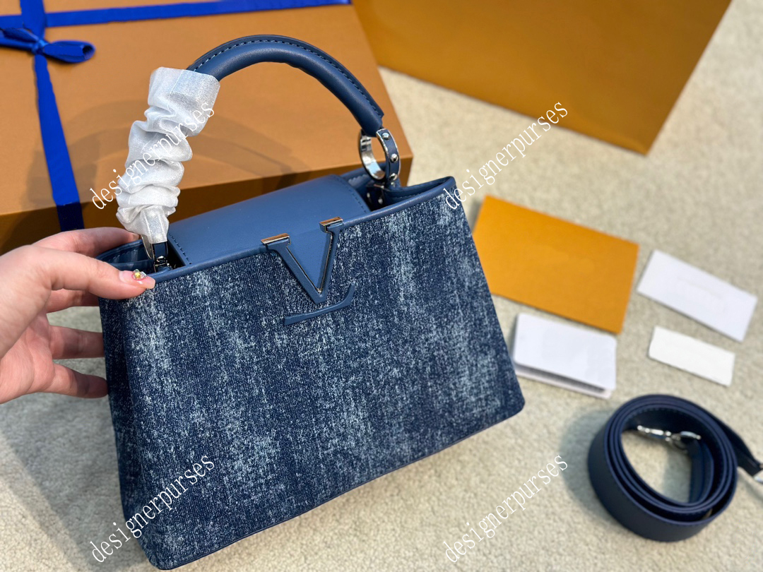 TZ Classic Capucines Lady bag Luxury Cowhide handbags Fashion golden buckle hardware handbag Women shoulder crossbody bag denim clutch bags Designer tote bags 28CM, Blue
TZ Classic Capucines Lady bag Luxury Cowhide handbags Fashion golden buckle hardware handbag Women shoulder crossbody bag denim clutch bags Designer tote bags 28CM, Blue