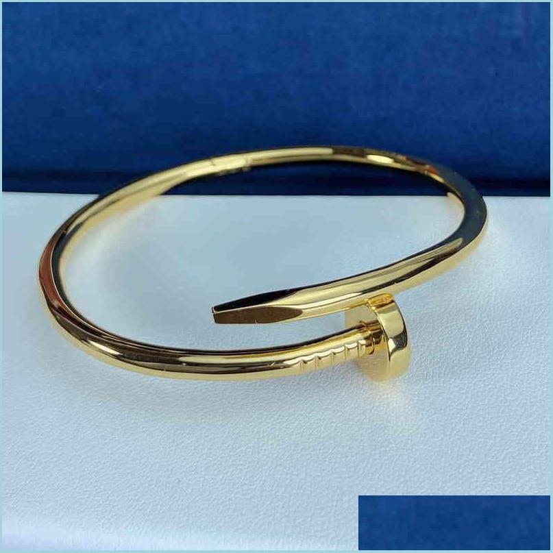 Bangle Nail Series 5A Gold Au 750 Never Fade 16 17 18 Size With Box Official Replica Luxury Brand Jewelry Premium Gifts Drop Deliver Dh1Ou
Bangle Nail Series 5A Gold Au 750 Never Fade 16 17 18 Size With Box Official Replica Luxury Brand Jewelry Premium Gifts Drop Deliver Dh1Ou