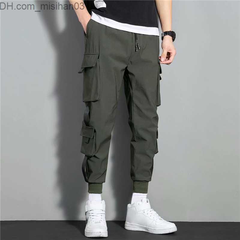 Men's Pants New hip-hop jogger cargo pants Men's harem pants Multi pocket ribbon Men's sports pants Street casual pants Men's spor
