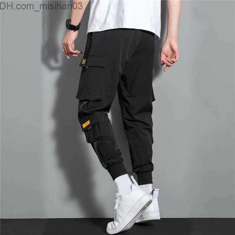 Men's Pants New hip-hop jogger cargo pants Men's harem pants Multi pocket ribbon Men's sports pants Street casual pants Men's spor