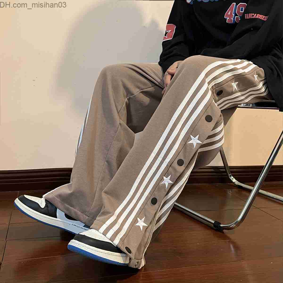 Men's Pants Men's hip-hop pants with side buttons and elastic waist for a loose style jogger Trousers Z230802