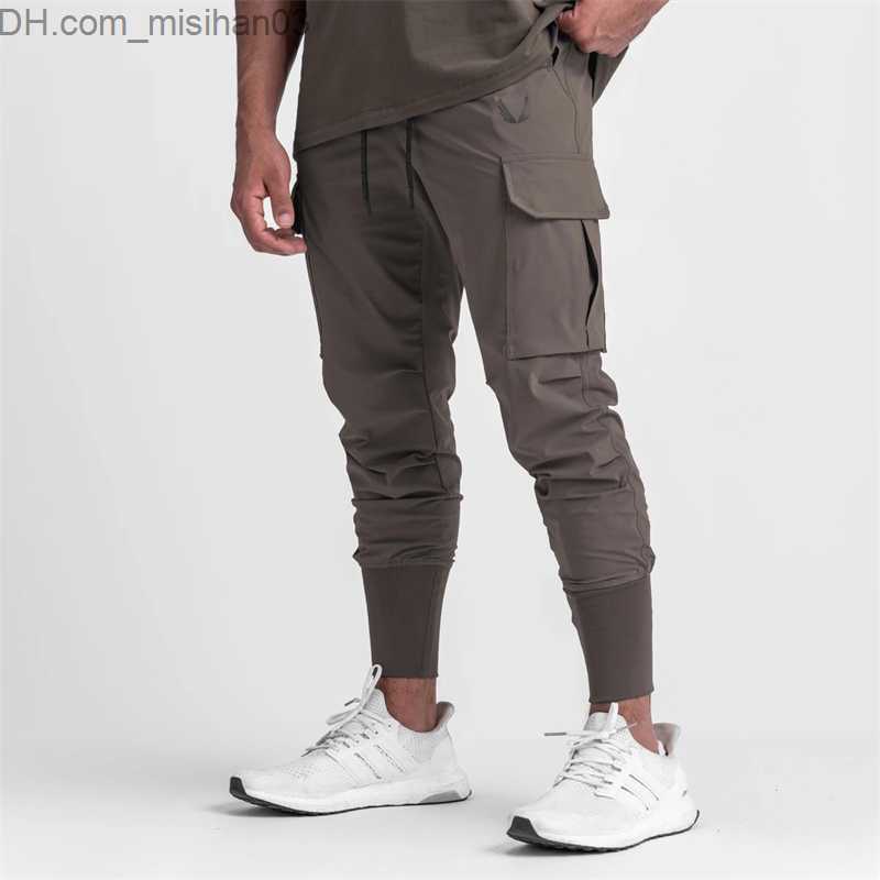 Men's Pants 2022 New Men's Cargo Pants Summer Thin Loose Quick Dry Elastic Tight Running Training Pants Casual Trends Trousers Z230802
