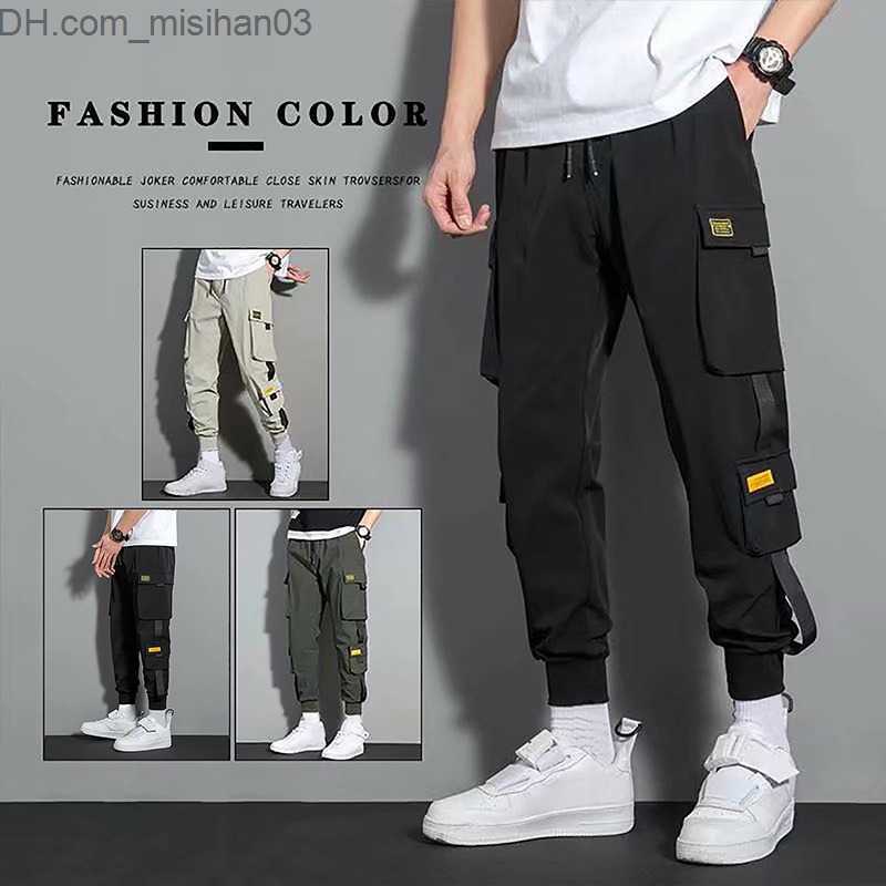 Men's Pants New hip-hop jogger cargo pants Men's harem pants Multi pocket ribbon Men's sports pants Street casual pants Men's spor