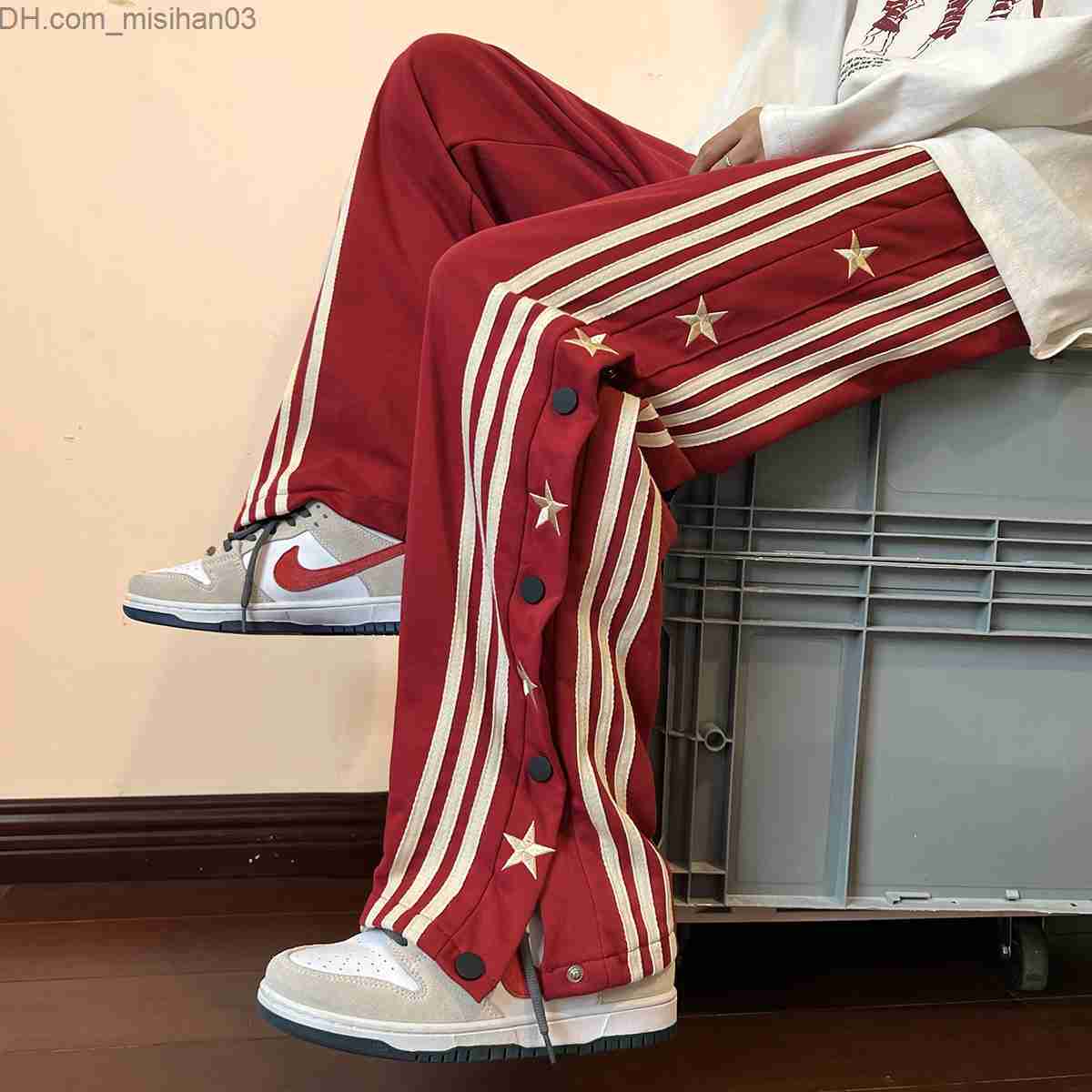 Men's Pants Men's hip-hop pants with side buttons and elastic waist for a loose style jogger Trousers Z230802