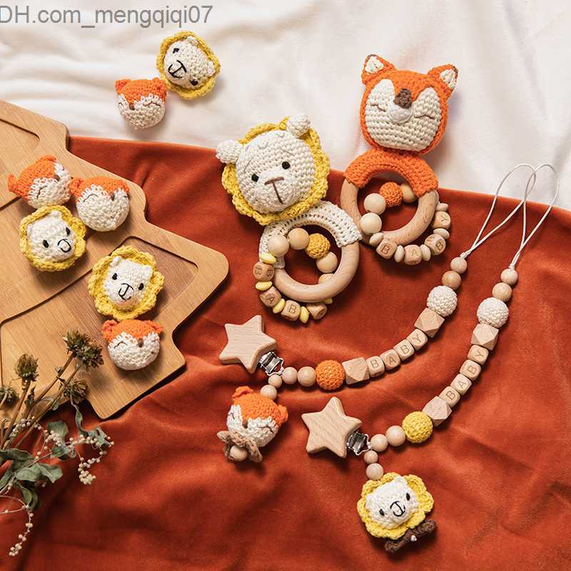Pacifier Holders Clips# 2 food grade baby wooden teeth Rattlesnake toy crochet animal lion fox baby pacifier chain tooth bracelet newborn gift Z230804