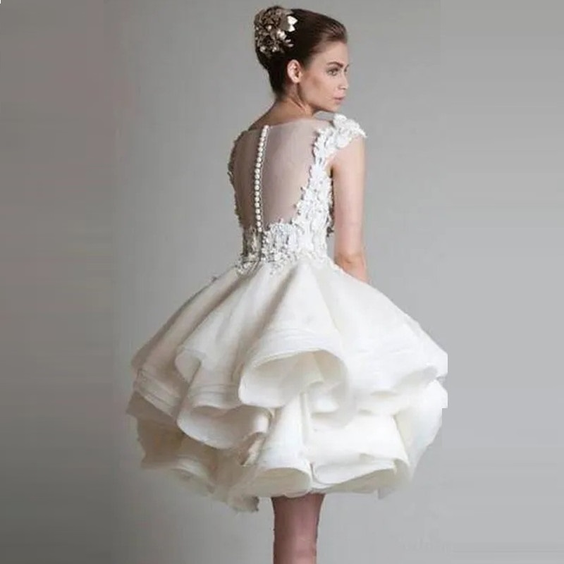 Krikor Jabotian Short Lace Wedding Dresses 2023 Bateau Cap Sleeves Backless Knee Length A line Organza Beach Bridal Bowns
