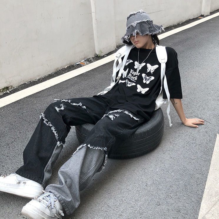 Mens Jeans Raw edge jeans mens and womens trend hiphop tassel stitching denim pants trendy high street Harajuku style loose trousers 230809