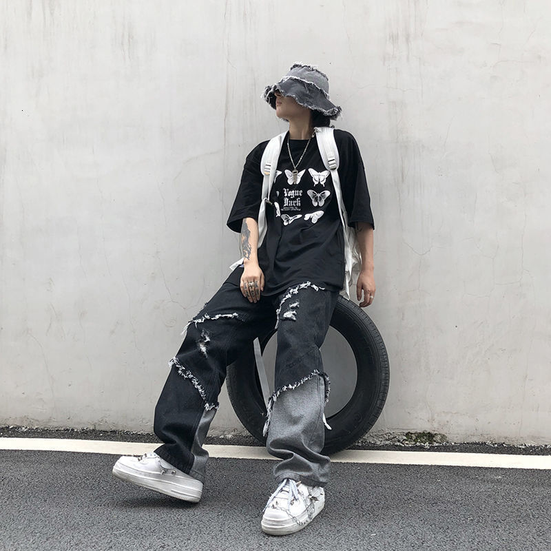 Mens Jeans Raw edge jeans mens and womens trend hiphop tassel stitching denim pants trendy high street Harajuku style loose trousers 230809