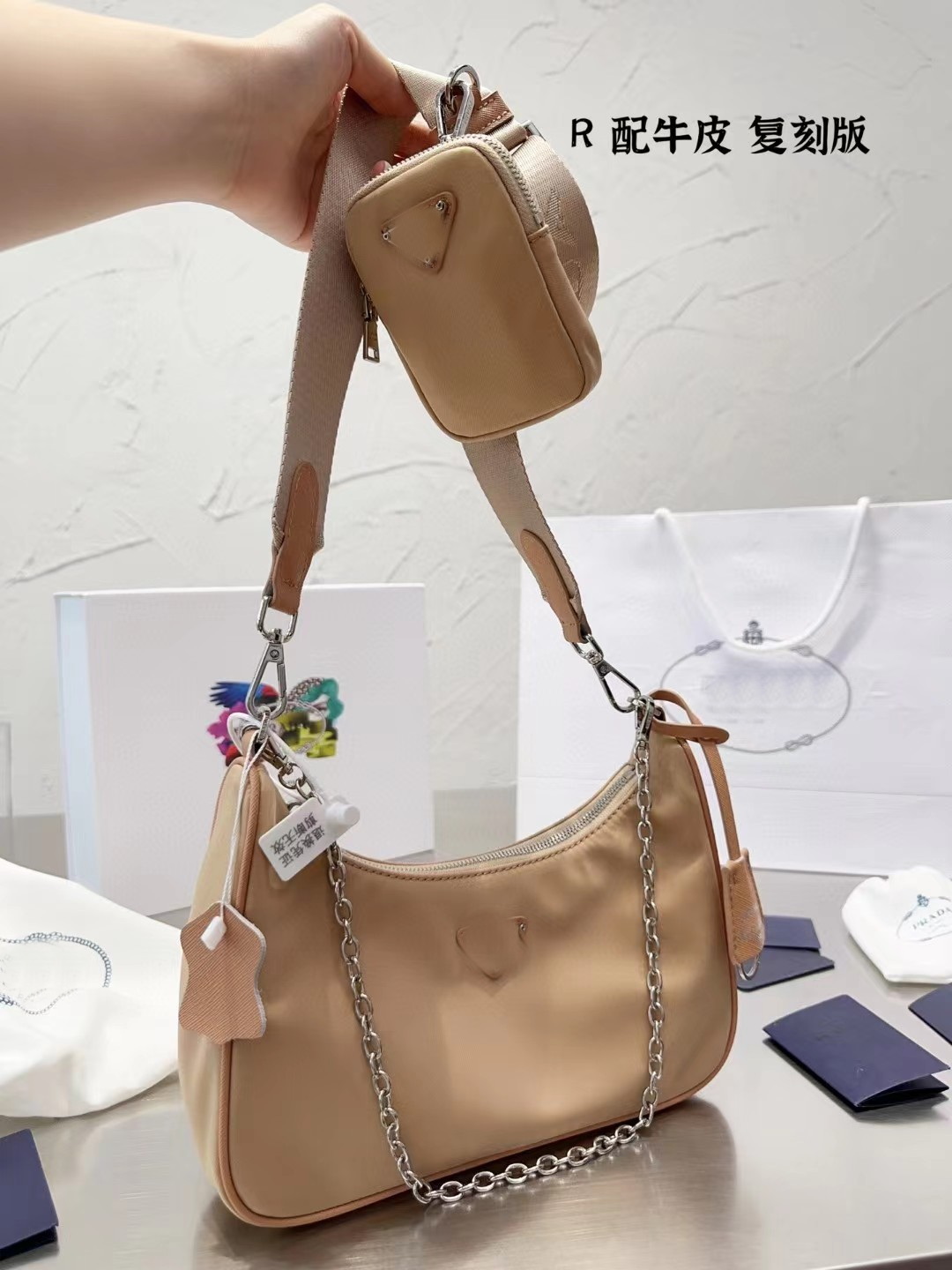 Pu 2023 spring and summer new wide shoulder strap dumpling bag three-in-one curved women's crossbody one shoulder portable high-end light
