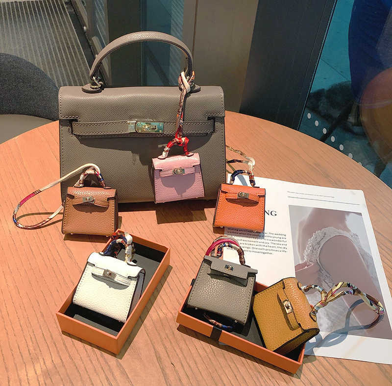 Home H Fashion Genuine Leather Mini Bag Kelly Bag Pendant Lovely Women Mini Headset Bag Keychain Pendant