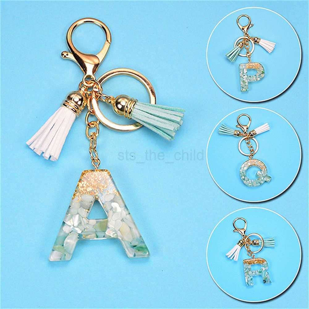 Keychains Lanyards Creative 26 Letter Resin Keychains Charms With White Green Tassel Car Key Ring Pendant Bag Ornaments Accessories Birthday Gifts
