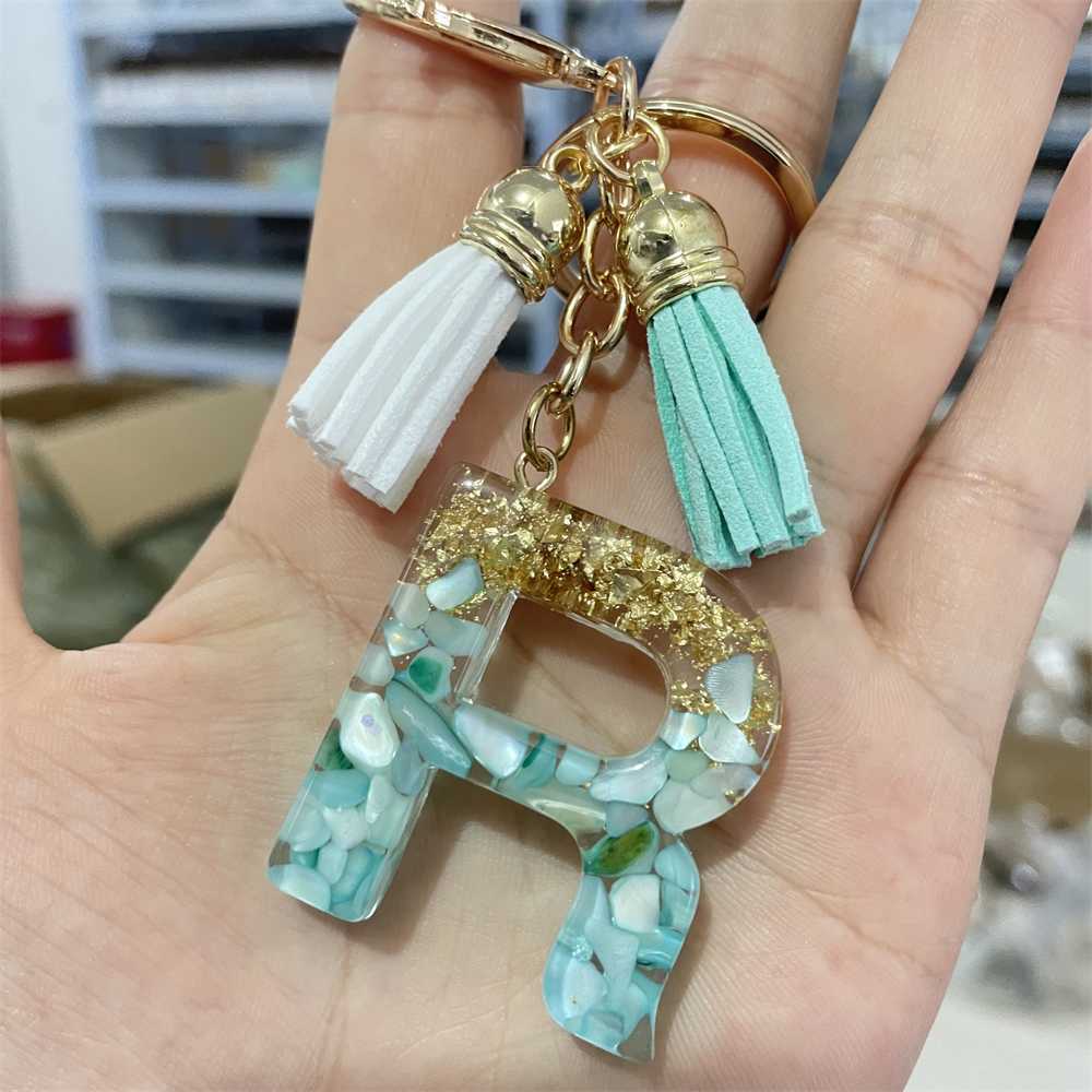 Keychains Lanyards Creative 26 Letter Resin Keychains Charms With White Green Tassel Car Key Ring Pendant Bag Ornaments Accessories Birthday Gifts