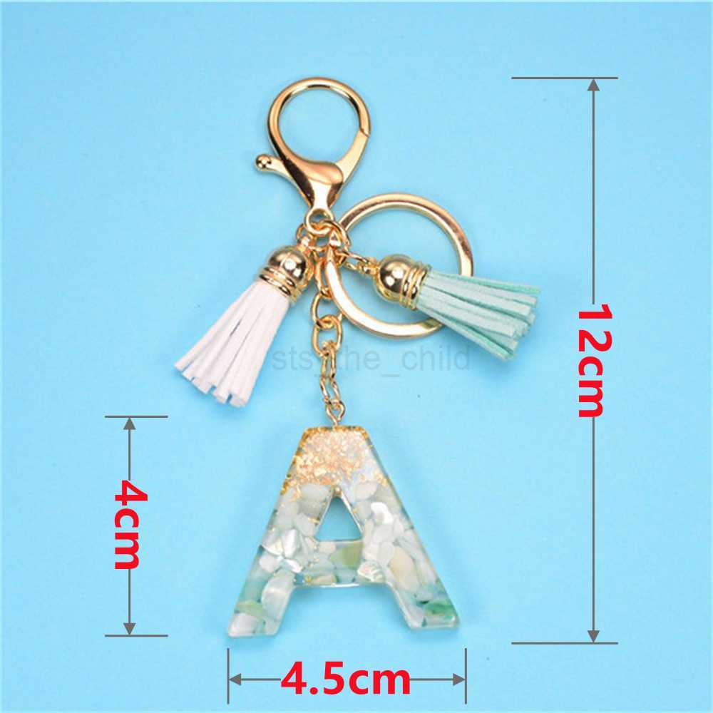Keychains Lanyards Creative 26 Letter Resin Keychains Charms With White Green Tassel Car Key Ring Pendant Bag Ornaments Accessories Birthday Gifts