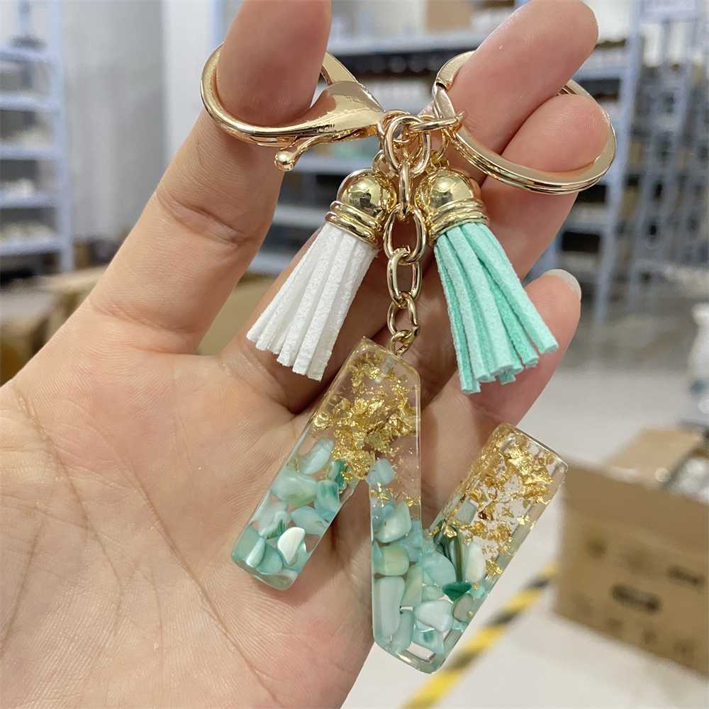 Keychains Lanyards Creative 26 Letter Resin Keychains Charms With White Green Tassel Car Key Ring Pendant Bag Ornaments Accessories Birthday Gifts