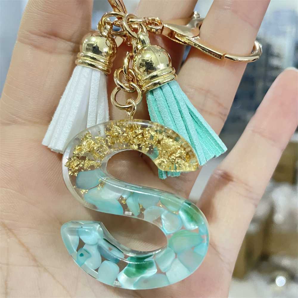 Keychains Lanyards Creative 26 Letter Resin Keychains Charms With White Green Tassel Car Key Ring Pendant Bag Ornaments Accessories Birthday Gifts