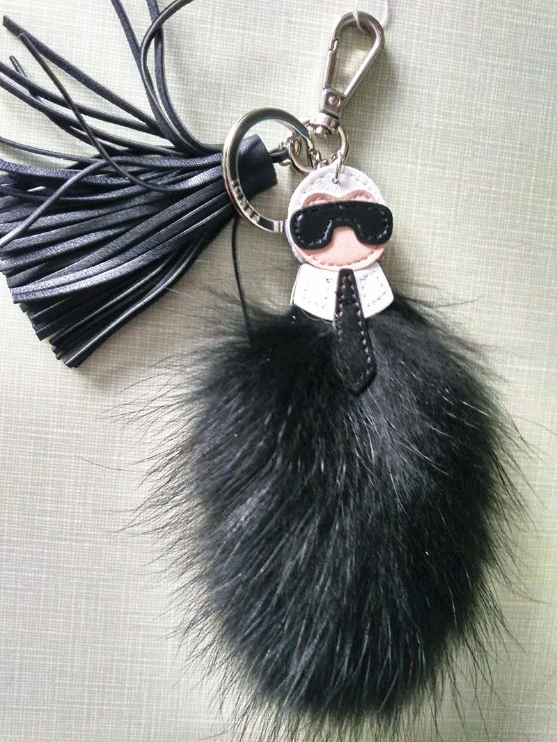 luxury logo Fluffy Karl Genuine Raccoon Fur Pompom Monster Bag Bugs Charm Keychain Plush Key Ring Leather Tassel Pompom 2023