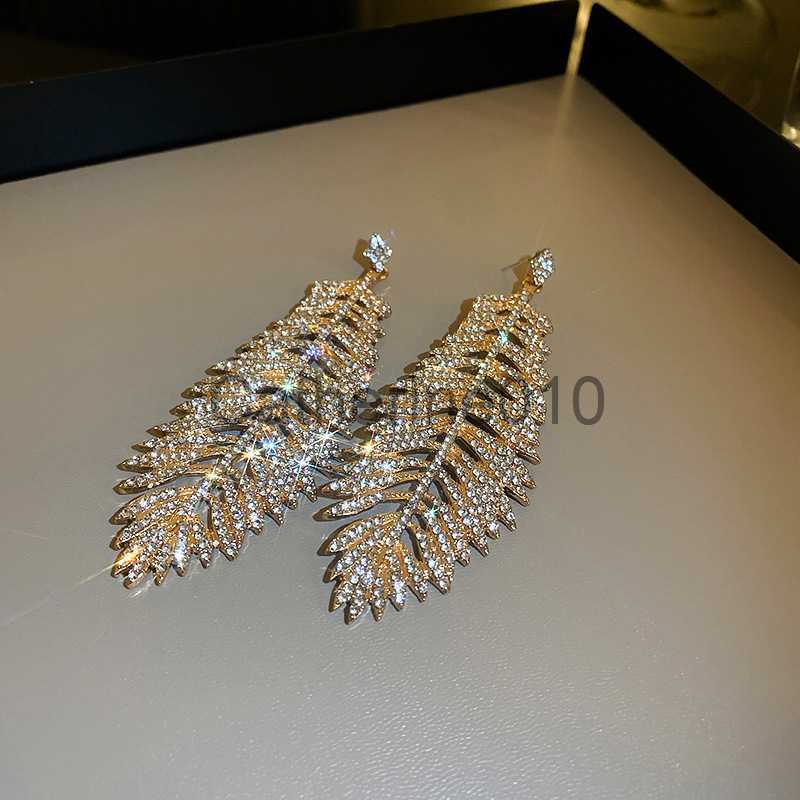 Charm 2023 New Fashion Trend Unique Design Elegant Delicate Zircon Feather Leaves Tassel Earrings Women Jewelry Party Premium Gift J230817