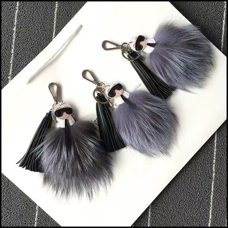 luxury logo Fluffy Karl Genuine Raccoon Fur Pompom Monster Bag Bugs Charm Keychain Plush Key Ring Leather Tassel Pompom Cute