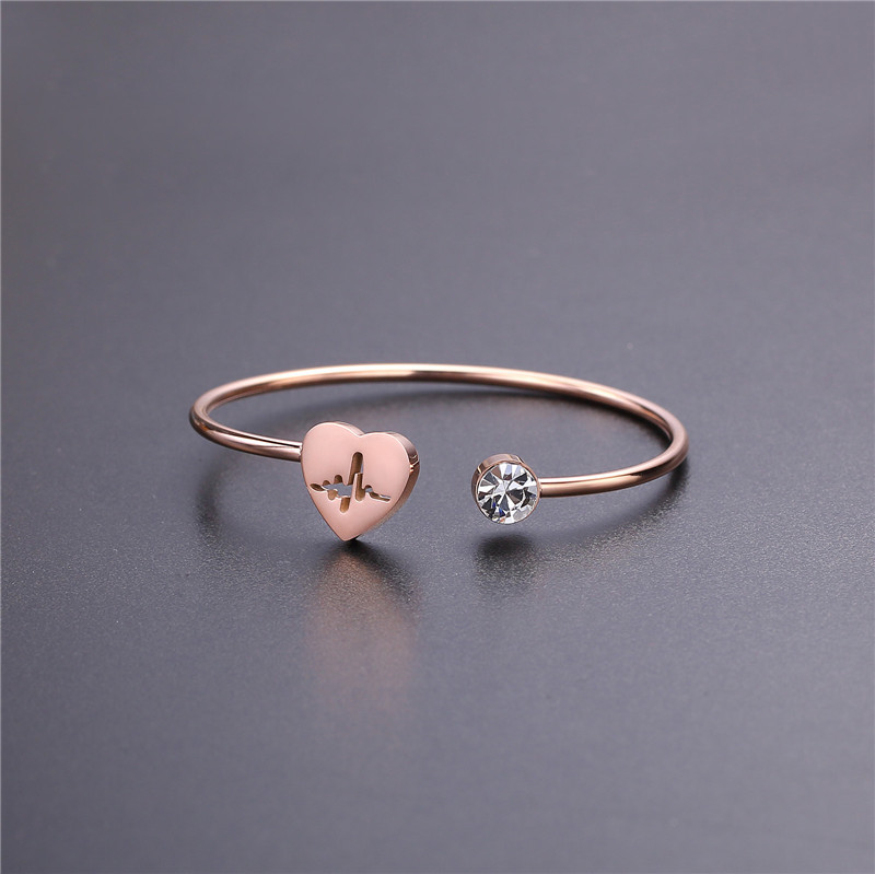 Women's Rose Gold & Silver Hard Body Heart-Shaped Hollow Bracelet - Elegant Designer Accessory for Fashionable Girls