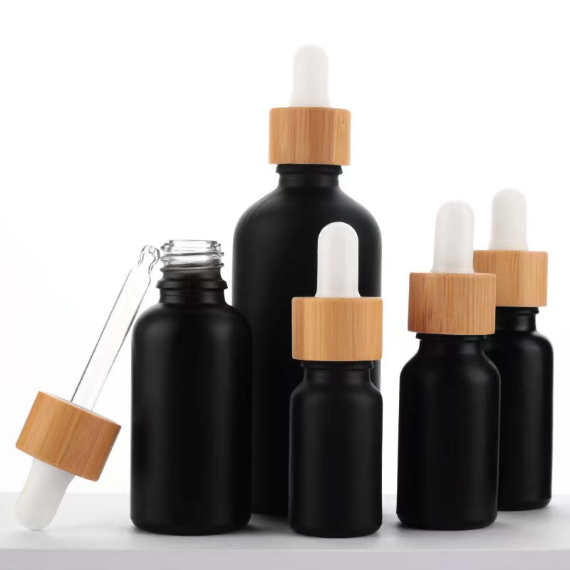 Matte Black Glass Essential Oil Bottles Skin Care Serum Dropper Bottle with Bamboo Pipette 10ml 15ml 20ml 30ml 50ml 100ml