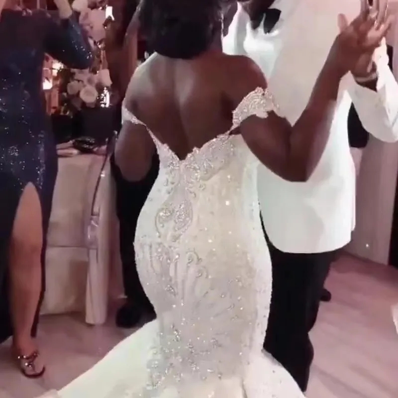 2024 Plus Size Mermaid Wedding Dress Arabic Aso Ebi Lace Beaded Off The Shoulder Trumpet Bridal Gowns Sweep Train Tulle Lace African Vestidos De NovIa