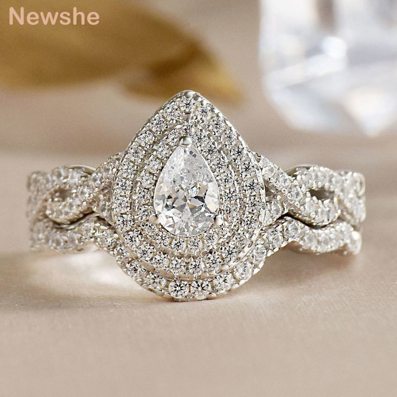 Wedding Rings she Halo Pear Cut AAAAA Cubic Zircon 925 Sterling Silver Infinity Engagement Rings For Women Wedding Band Bridal Ring Set 230301
Wedding Rings she Halo Pear Cut AAAAA Cubic Zircon 925 Sterling Silver Infinity Engagement Rings For Women Wedding Band Bridal Ring Set 230301