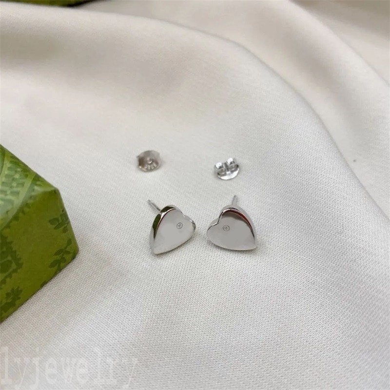 Couples designers luxury fashion stud Earrings hearts weddings engagement creative orecchini gold color jewlery luxuries cjeweler designer earrings ZB017 E23 
Couples designers luxury fashion stud Earrings hearts weddings engagement creative orecchini gold color jewlery luxuries cjeweler designer earrings ZB017 E23