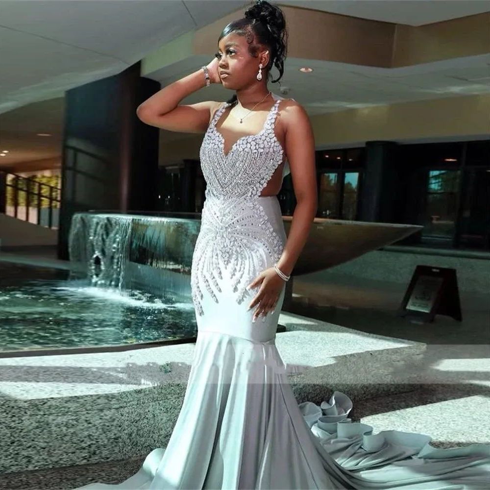 2023 Sexy Mermaid Prom Dresses Orange Silver Plus Size Arabic Illusion Neck Rhinestone Crystal Beading Illusion Sleeveless Evening Formal Party Gowns 