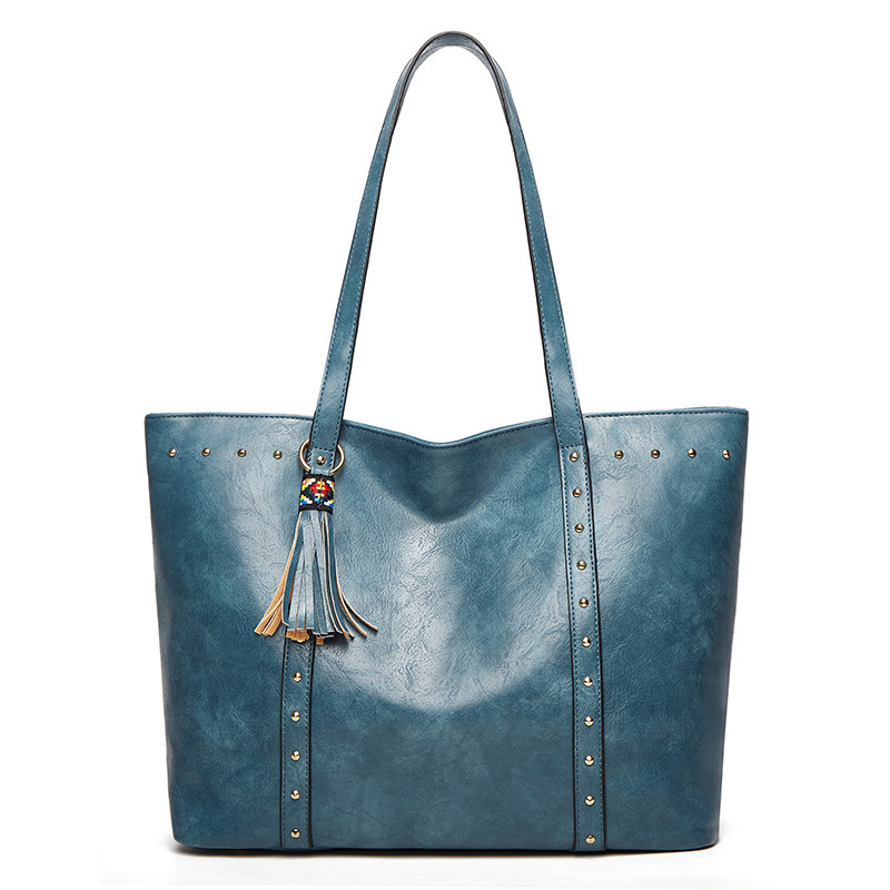 Fashion handbag Women's casual bag Solid tassel decorative shoulder bag