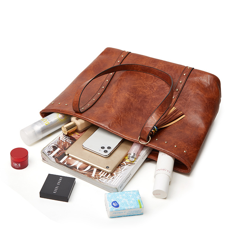 Fashion handbag Women's casual bag Solid tassel decorative shoulder bag