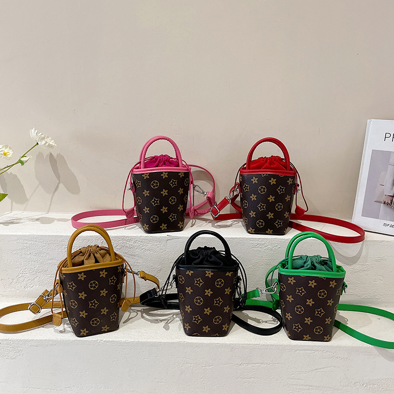 INS Children printed handbags fashion kids PU leather messenger bag girls princess bucket bag A9696, Pink
INS Children printed handbags fashion kids PU leather messenger bag girls princess bucket bag A9696, Pink