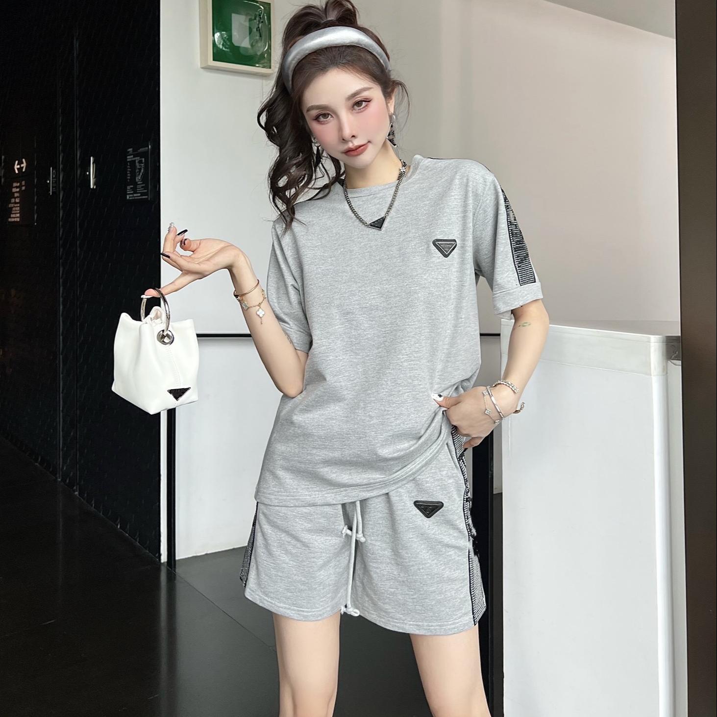 Fashion Designer Printing Women Tracksuits For 2023 Summer Ladies Short Sleeve Tops Shorts Two Piece Sets, Gray
Fashion Designer Printing Women Tracksuits For 2023 Summer Ladies Short Sleeve Tops Shorts Two Piece Sets, Gray