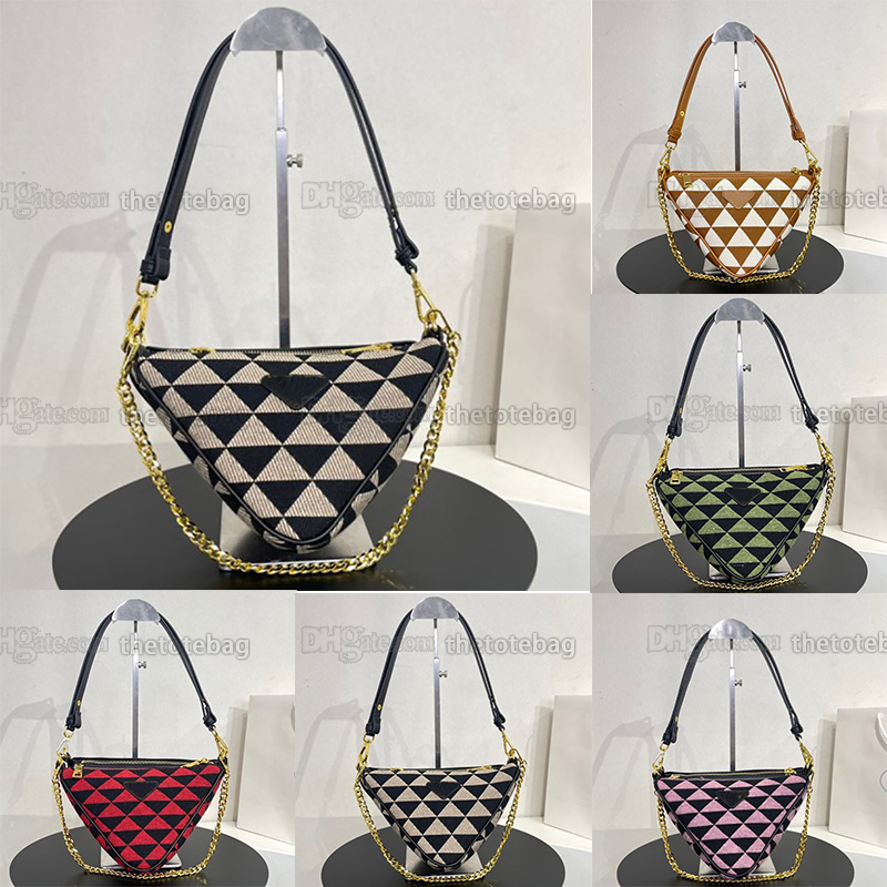 Symbole leather and fabric mini bag Luxury Designer Metal hardware Enameled metal triangle logo on the front Shoulder Bags Zipper closure Detachable chain handle
Symbole leather and fabric mini bag Luxury Designer Metal hardware Enameled metal triangle logo on the front Shoulder Bags Zipper closure Detachable chain handle