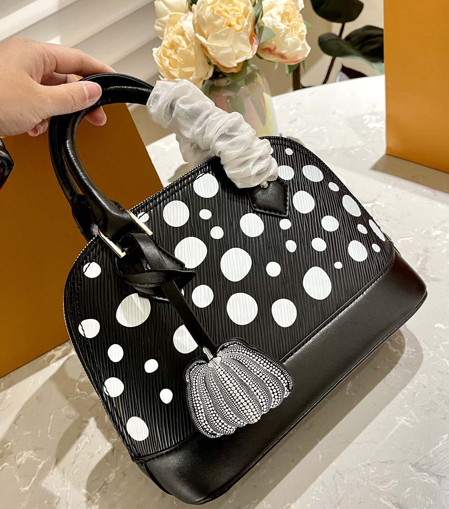 L ALMA Shell Bag BB Painted Dots Yayoi Kusama Handbag Designer Women Handle Bag Luruxy Purse Infinity Dots padlock Grained Epi Leather pumpkin shaped charm dhgate, Yellow
L ALMA Shell Bag BB Painted Dots Yayoi Kusama Handbag Designer Women Handle Bag Luruxy Purse Infinity Dots padlock Grained Epi Leather pumpkin shaped charm dhgate, Yellow