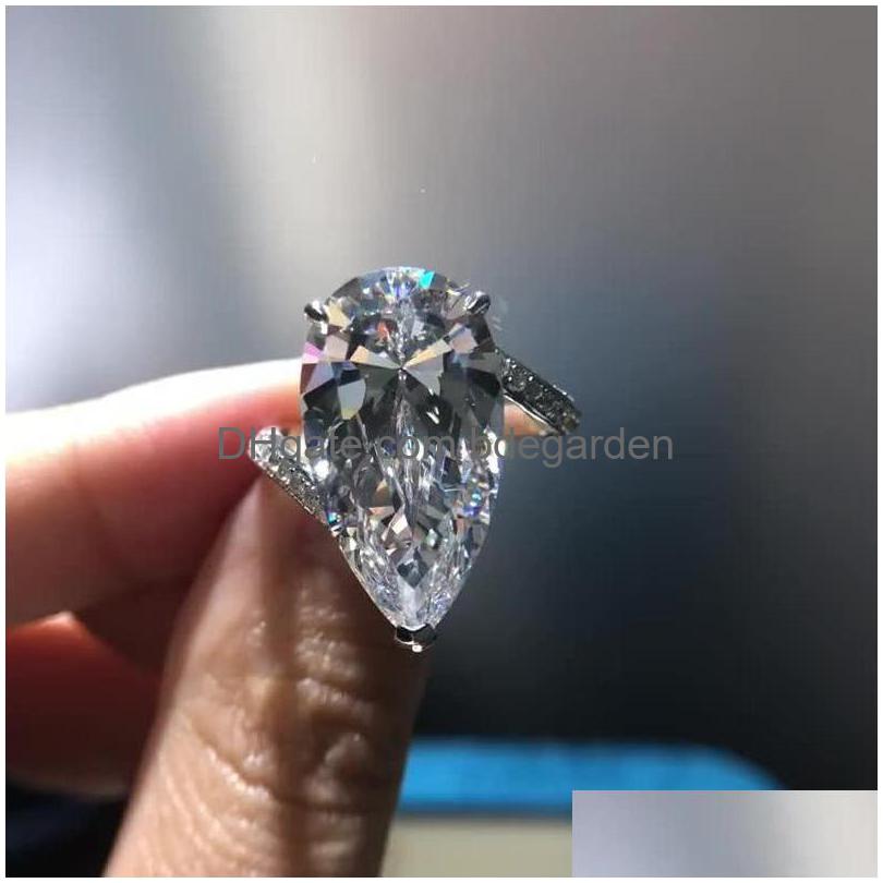 Band Rings New Trendy Style Luxury Pave Diamond Pear Shape Cz Zircon Engagement For Women Finger Ring Sier Drop Delivery Jewe Dhyp0
Band Rings New Trendy Style Luxury Pave Diamond Pear Shape Cz Zircon Engagement For Women Finger Ring Sier Drop Delivery Jewe Dhyp0