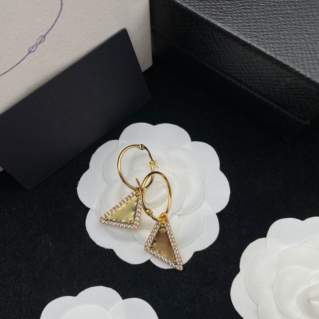 new women's stud earrings inverted triangle stud earrings female designer temperament European and American street trend hip-hop earrings birthday souveni
