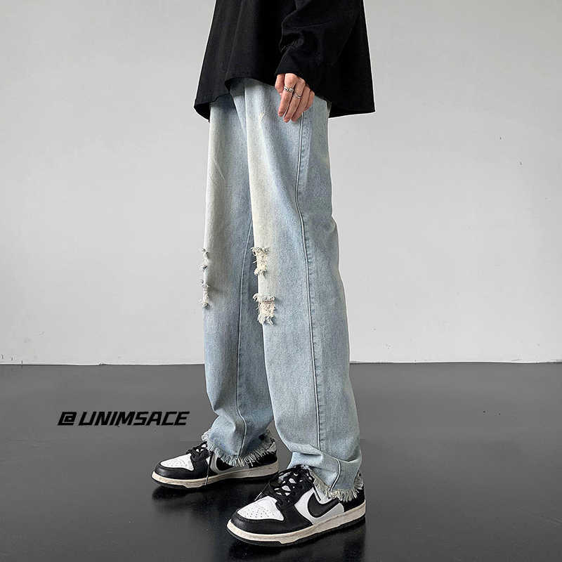 Men's Jeans White Blue Black Ripped Jeans Men Fashion Casual Straight Jeans Men Streetwear Hiphop Loose Hole Denim Pants Mens Trousers Z0301