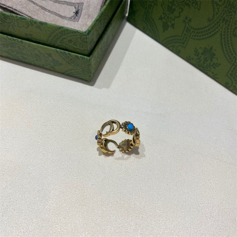 Classic zircon daisy flowers designer rings for woman natural beauty double g letters 527394 J8474 8517 jewelry plated gold ring vintage old effect ZB038 E23
Classic zircon daisy flowers designer rings for woman natural beauty double g letters 527394 J8474 8517 jewelry plated gold ring vintage old effect ZB038 E23