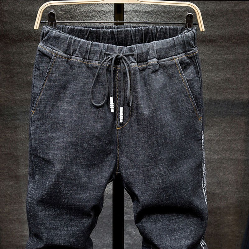 Men's Jeans Large size jeans black men's man plus size harem pants autumn elastic stretch Slim feet trousers 7XL 6XL 5XL 230308