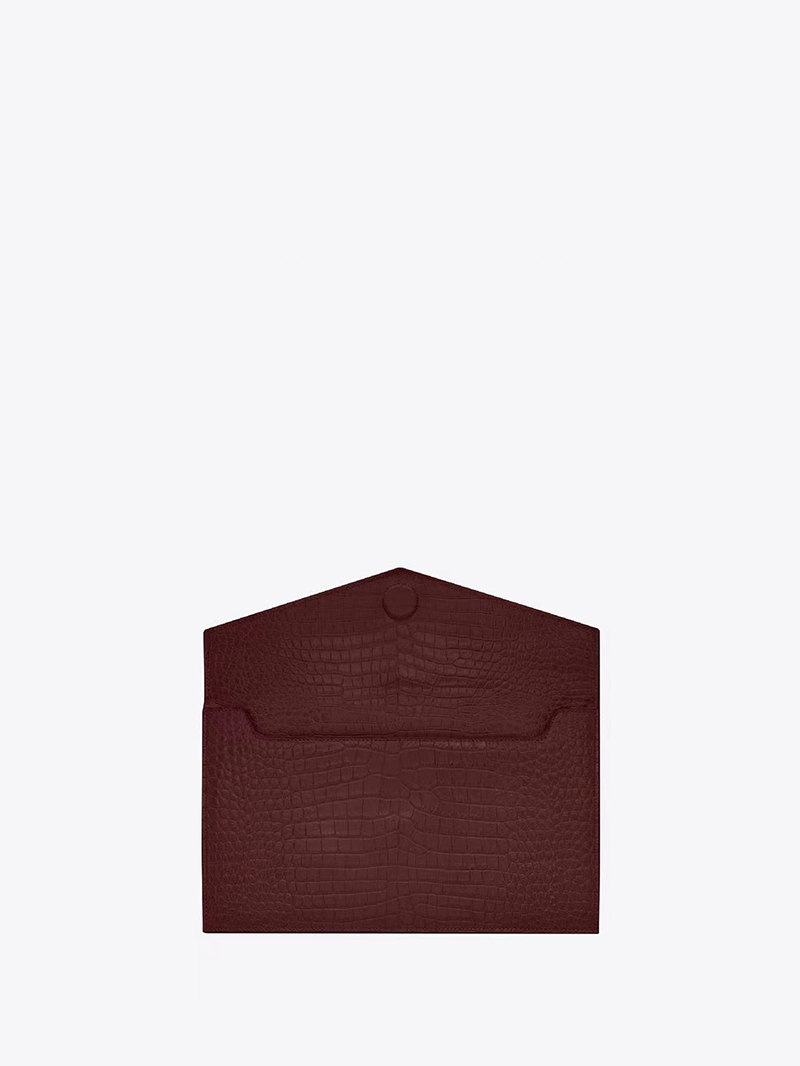 ladies up down grain embossed leather clutch bag