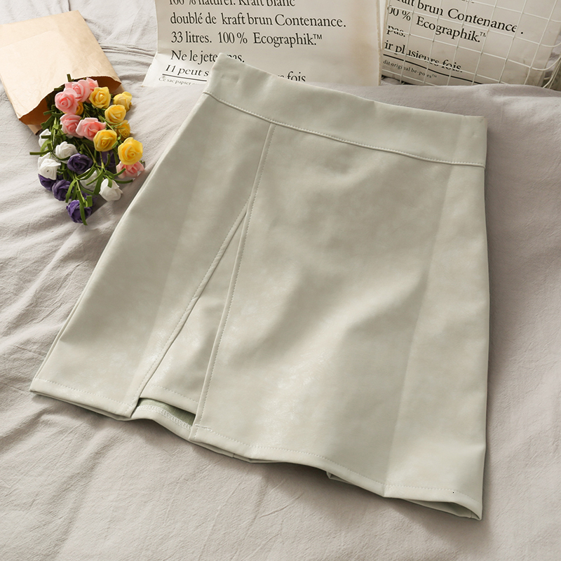 Skirts HELIAR PU Leather Skirts Women A-line Sexy Split Skirts Spring Mini Wide Leg Night Club Mini Skirts For Women Spring 230308
