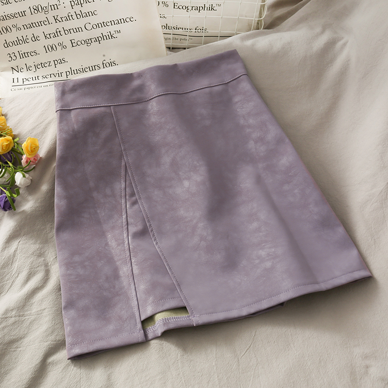 Skirts HELIAR PU Leather Skirts Women A-line Sexy Split Skirts Spring Mini Wide Leg Night Club Mini Skirts For Women Spring 230308