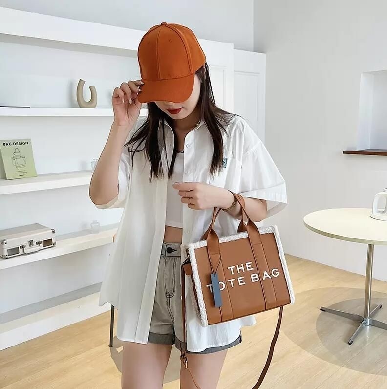 PU Leather Marc Handbags Bag with Logo Large Capacity Shoulder for Women wallets Letter Printed Tote Bag Multi Colors Totes Purse, Orange
PU Leather Marc Handbags Bag with Logo Large Capacity Shoulder for Women wallets Letter Printed Tote Bag Multi Colors Totes Purse, Orange