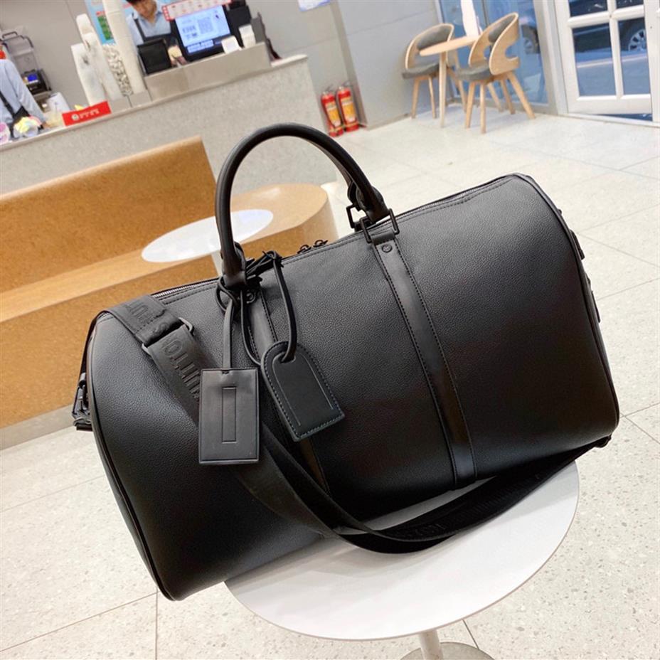 2021 luxury fashion men women high-quality travel duffle bags bandouliere 40 45 designer bags luggage handbags With lock large cap252B, Black
2021 luxury fashion men women high-quality travel duffle bags bandouliere 40 45 designer bags luggage handbags With lock large cap252B, Black